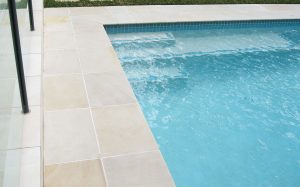 pool surrounds sandstone