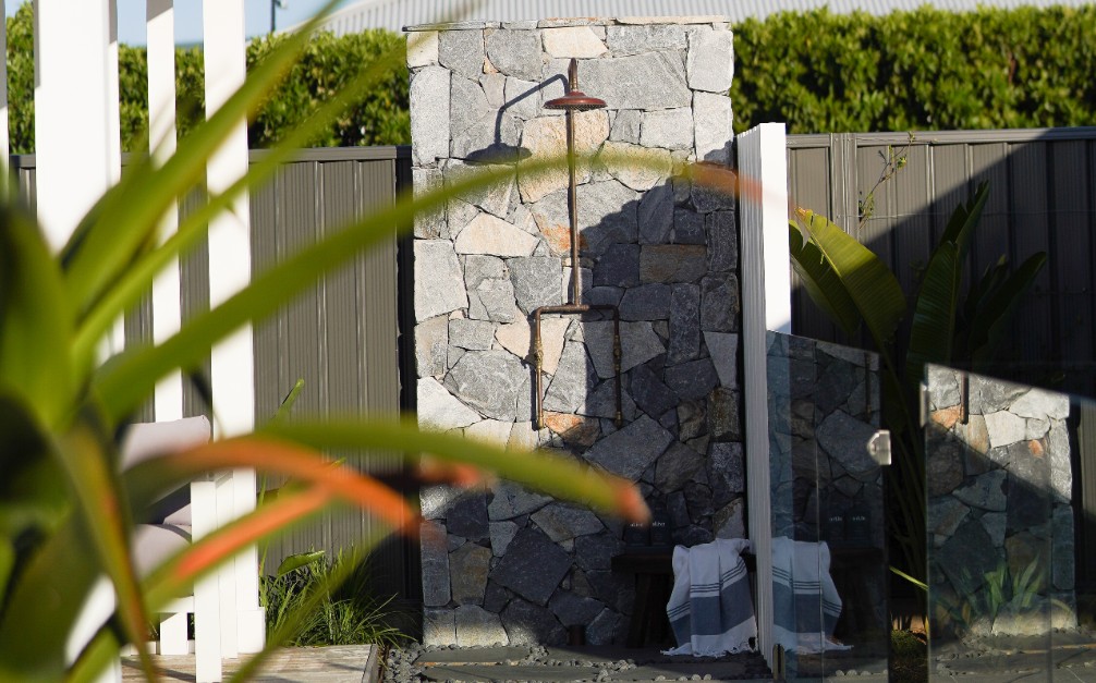 outdoor shower with wall cladding