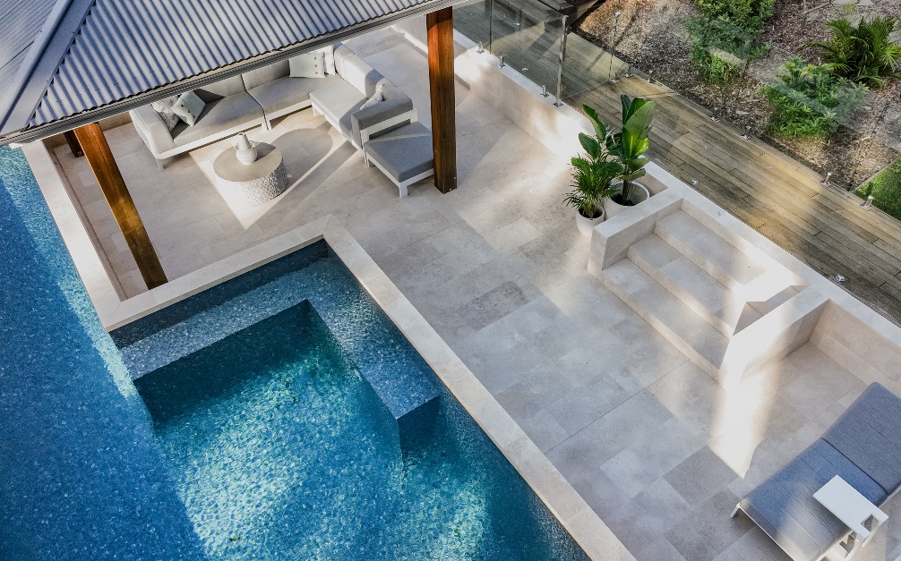 crema vialle limestone pool drone