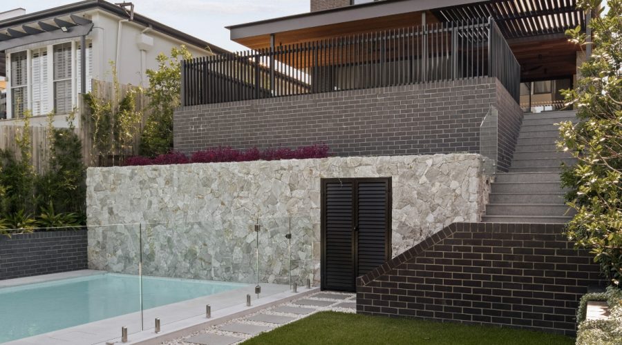 Hotham Wall Cladding, Luna Chiaro Limestone pool surrounds & Silhouette Granite stairs